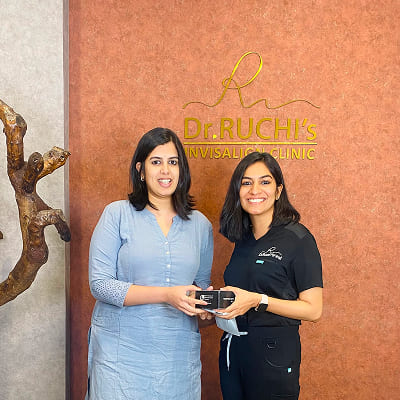 Dr. Ruchi Porwal with patient at Dr. Ruchi's Dental Care